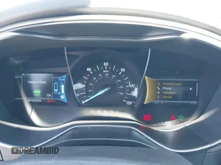 2014 Ford Fusion SE Hybrid with VIN 3FA6P0LU5ER393530, listed as a IAAI auction lot 42478440 with 93,728 mi miles and . Bid and sale history available at DreamBid. Image 7.