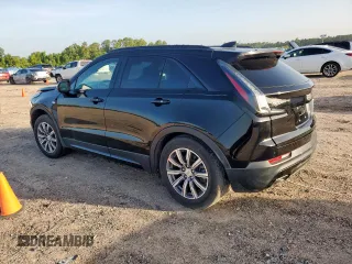 2020 Cadillac XT4 FWD Sport with VIN 1GYFZER45LF146781, listed as a Copart auction lot 65171615 with 65,177 mi miles and Salvage title. Bid and sale history available at DreamBid. Image 2.
