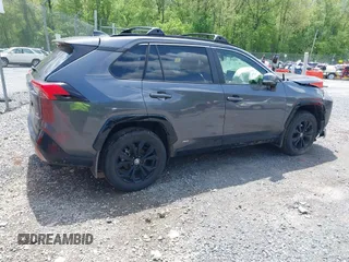 2023 Toyota RAV4 Hybrid SE with VIN JTM16RFV9PD113152, listed as a IAAI auction lot 42177056 with 41,204 mi miles and . Bid and sale history available at DreamBid. Image 4.