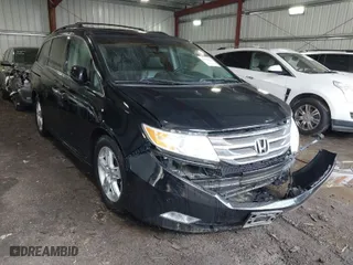 2011 Honda Odyssey Touring with VIN 5FNRL5H93BB073690, listed as a IAAI auction lot 41962054 with 134,711 mi miles. Bid and sale history available at carsss.com. Image 1.