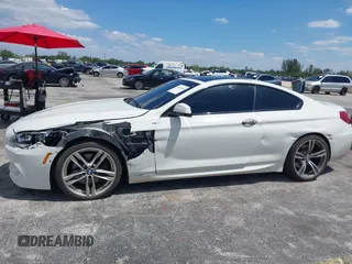 2014 BMW 6 Series 650i with VIN WBAYM9C55ED248244, listed as a IAAI auction lot 42043456 with 144,664 mi miles and . Bid and sale history available at DreamBid. Image 6.