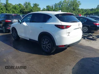 2018 Mazda CX-5 Grand Touring z VIN JM3KFBDM8J0420422, wystawiony jako IAAI lot #42188348 z przebiegiem 102 216 mil mil oraz . Historia ofert i sprzedaży dostępna na DreamBid. Obrazek 3.