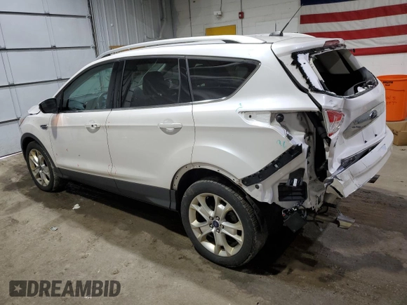 2016 Ford Escape Titanium with VIN 1FMCU9J93GUB78230, listed as a Copart auction lot 51661025 with 98,515 mi miles and Salvage Title. Bid and sale history available at DreamBid. Image 2.