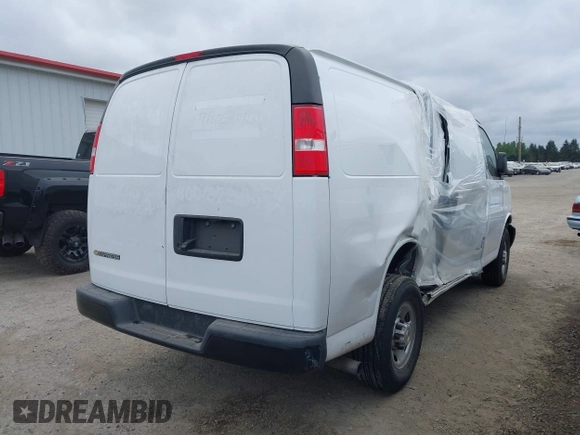 2023 Chevrolet Express Cargo with VIN 1GCWGAFP4P1176442, listed as a IAAI auction lot 42109509 with 42,680 mi miles and . Bid and sale history available at DreamBid. Image 4.