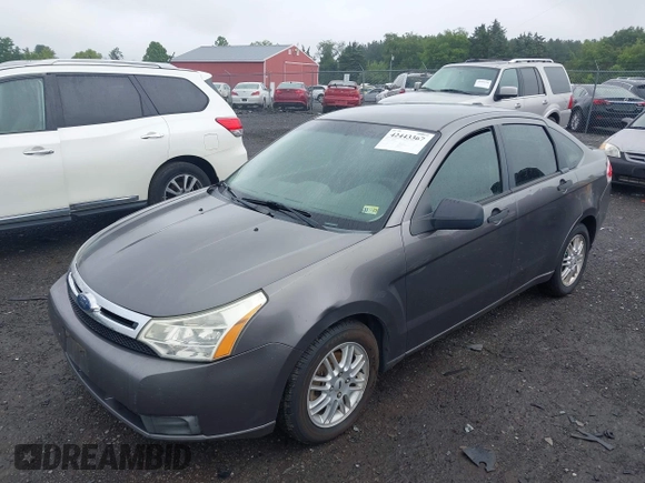 2009 Ford Focus SE z VIN 1FAHP35N59W180533, wystawiony jako IAAI lot #42443367 z przebiegiem 176 065 mil mil oraz . Historia ofert i sprzedaży dostępna na DreamBid. Obrazek 2.