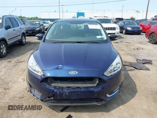 2016 Ford Focus Titanium with VIN 1FADP3N26GL206866, listed as a IAAI auction lot 42403015 with 95,753 mi miles and . Bid and sale history available at DreamBid. Image 12.