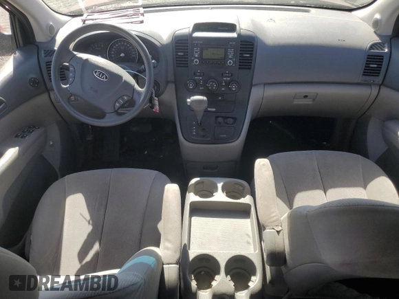 2012 Kia Sedona LX with VIN KNDMG4C79C6483194, listed as a Copart auction lot 77485374 with 110,831 mi miles and Salvage Title. Bid and sale history available at carsss.com. Image 8.