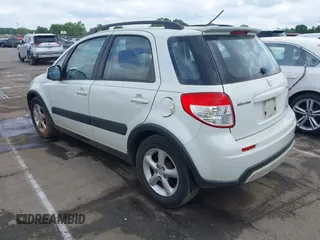 2007 Suzuki SX4 with VIN JS2YB413975105927, listed as a IAAI auction lot 42136696 with 232,480 mi miles. Bid and sale history available at carsss.com. Image 3.
