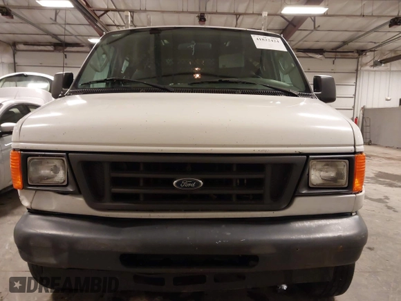 2006 Ford Econoline Cargo with VIN 1FTNE24W56DA13331, listed as a IAAI auction lot 41822424 with 370,496 mi miles and . Bid and sale history available at DreamBid. Image 13.