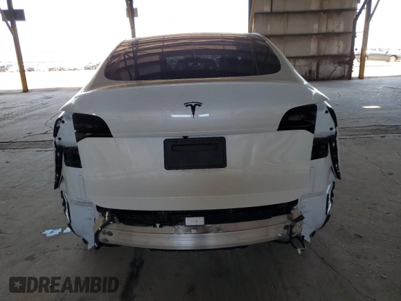 2021 Tesla Model Y Long Range z VIN 5YJYGDEE2MF243858, wystawiony jako Copart lot #58043055 z przebiegiem 24 128 mil mil oraz Szkoda całkowita • Salvage title. Historia ofert i sprzedaży dostępna na DreamBid. Obrazek 6.