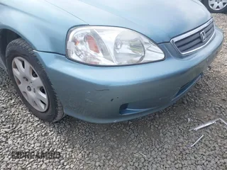 2000 Honda Civic VP z VIN 2HGEJ6618YH521482, wystawiony jako IAAI lot #41940776 z przebiegiem 77 745 mil mil oraz . Historia ofert i sprzedaży dostępna na DreamBid. Obrazek 6.