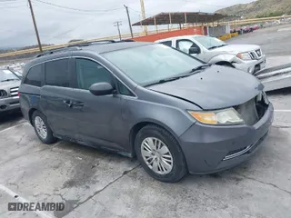 2014 Honda Odyssey LX with VIN 5FNRL5H28EB101376, listed as a IAAI auction lot 41772529 with 122,504 mi miles. Bid and sale history available at carsss.com. Image 1.