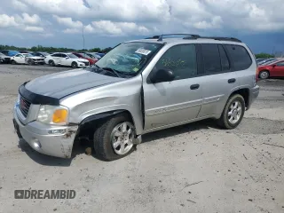 2005 GMC Envoy SLE z VIN 1GKDT13S052228382, wystawiony jako Copart lot #56833875 z przebiegiem 156 989 mil mil oraz Szkody całkowita. Historia ofert i sprzedaży dostępna na DreamBid. Obrazek 1.
