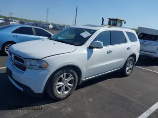 2013 Dodge Durango Crew with VIN 1C4RDJDG0DC670810, listed as a IAAI auction lot 41974024 with 209,379 mi miles and . Bid and sale history available at DreamBid. Image 2.