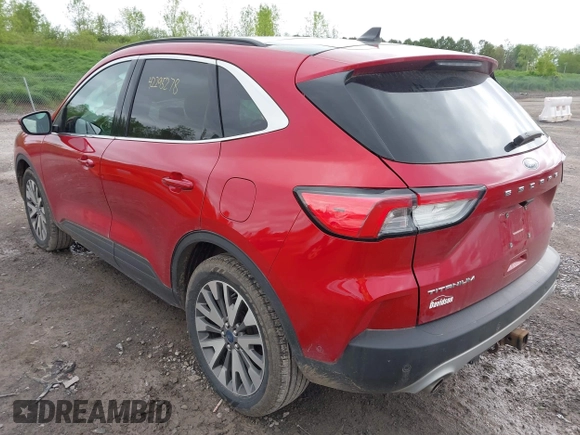 2020 Ford Escape Titanium with VIN 1FMCU9J99LUB28104, listed as a IAAI auction lot 42295278 with 73,706 mi miles and . Bid and sale history available at DreamBid. Image 3.