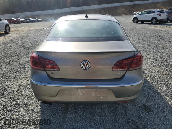 2013 Volkswagen CC R-Line z VIN WVWBN7AN0DE520527, wystawiony jako Copart lot #82555114 z przebiegiem 114 059 mil mil oraz Szkoda całkowita • Salvage title. Historia ofert i sprzedaży dostępna na DreamBid. Obrazek 6.