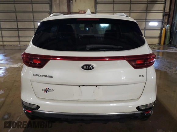2020 Kia Sportage EX z VIN KNDPNCAC6L7804485, wystawiony jako Copart lot #56988855 z przebiegiem 117 112 mil mil oraz Szkoda całkowita • Salvage title. Historia ofert i sprzedaży dostępna na DreamBid. Obrazek 6.