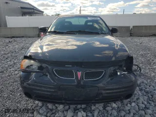 1999 Pontiac Grand Am SE2 with VIN 1G2NE52E2XM732523, listed as a Copart auction lot 75420684 with 124,110 mi miles and Salvage Title. Bid and sale history available at carsss.com. Image 5.