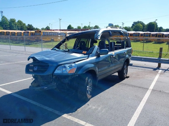 2005 Honda Pilot EX with VIN 2HKYF18405H565891, listed as a IAAI auction lot 39531740 with 112,701 mi miles. Bid and sale history available at carsss.com. Image 6.