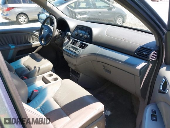 2008 Honda Odyssey EX-L with VIN 5FNRL38738B016711, listed as a IAAI auction lot 42181272 with 219,203 mi miles and . Bid and sale history available at carsss.com. Image 5.