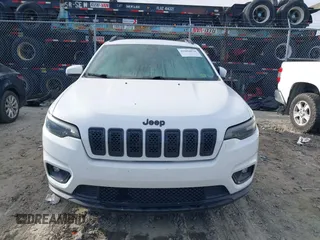 2019 Jeep Cherokee Latitude Plus with VIN 1C4PJLLX5KD403828, listed as a IAAI auction lot 41694076 with 85,718 mi miles and . Bid and sale history available at DreamBid. Image 12.