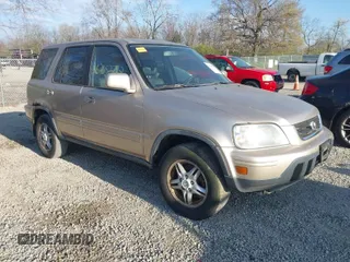 2000 Honda CR-V SE with VIN JHLRD187XYS014686, listed as a IAAI auction lot 42052783 with 208,740 mi miles. Bid and sale history available at carsss.com. Image 1.