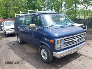 1987 Chevrolet Chevy Van z VIN 1GBEG25H3H7183753, wystawiony jako IAAI lot #42181464 z przebiegiem 135 683 mil mil oraz . Historia ofert i sprzedaży dostępna na DreamBid. Obrazek 1.
