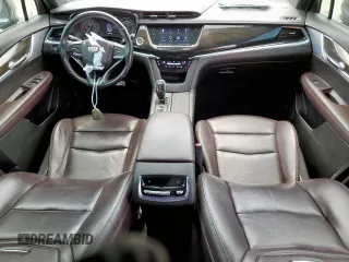 2020 Cadillac XT6 FWD Premium Luxury z VIN 1GYKPCRSXLZ104502, wystawiony jako Copart lot #58211275 z przebiegiem 97 053 mil mil oraz Szkody całkowita. Historia ofert i sprzedaży dostępna na DreamBid. Obrazek 8.