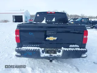 2015 Chevrolet Silverado 1500 High Country with VIN 3GCUKTEC0FG148198, listed as a IAAI auction lot 41493933 with 164,453 mi miles and . Bid and sale history available at DreamBid. Image 16.