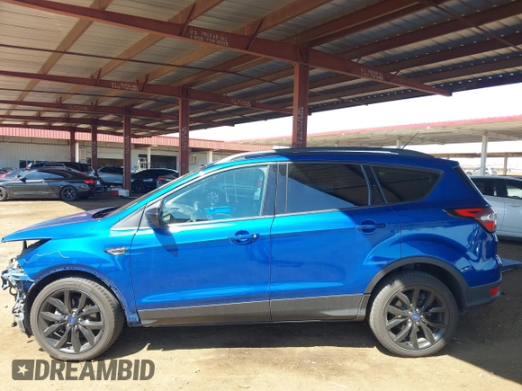 2018 Ford Escape SE with VIN 1FMCU9GDXJUA92416, listed as a IAAI auction lot 41848682 with 97,791 mi miles. Bid and sale history available at carsss.com. Image 15.