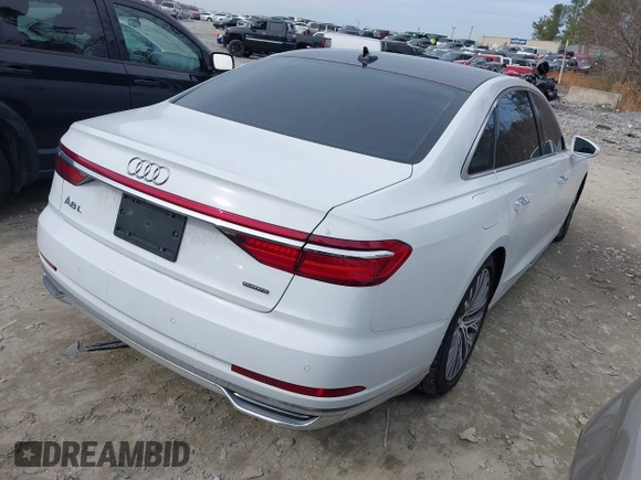 2019 Audi A8 L with VIN WAU8DAF83KN007358, listed as a IAAI auction lot 41540352 with 77,203 mi miles. Bid and sale history available at carsss.com. Image 4.