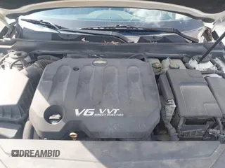 2014 Chevrolet Impala LT with VIN 1G1125S33EU101464, listed as a IAAI auction lot 41863521 with 215,270 mi miles and . Bid and sale history available at DreamBid. Image 10.