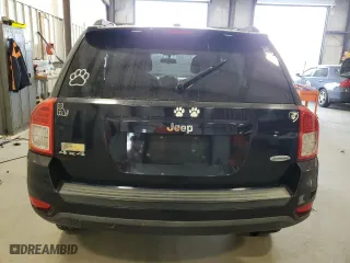 2011 Jeep Compass Latitude with VIN 1J4NF1FBXBD149976, listed as a Copart auction lot 49650265 with 147,056 mi miles and Salvage Title. Bid and sale history available at carsss.com. Image 6.