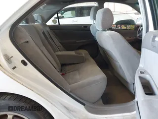 2004 Toyota Camry LE with VIN JTDBE32K540257588, listed as a IAAI auction lot 42208098 with 201,770 mi miles and . Bid and sale history available at DreamBid. Image 8.