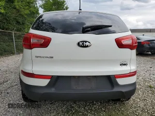2013 Kia Sportage LX with VIN KNDPBCA20D7501980, listed as a Copart auction lot 61784015 with 140,793 mi miles and Salvage title. Bid and sale history available at DreamBid. Image 6.
