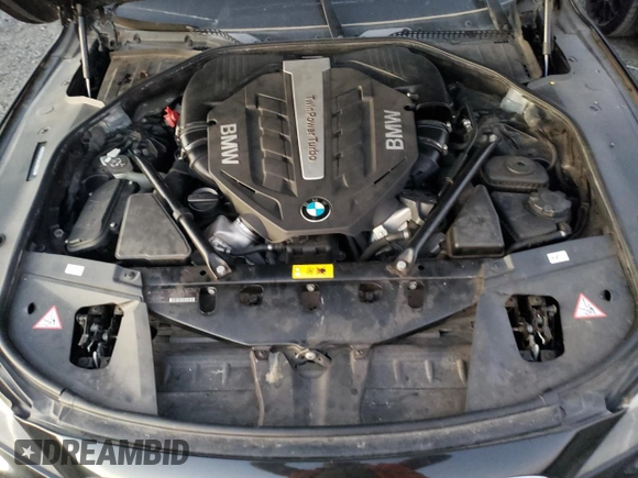 2012 BMW 7 Series with VIN WBAKX8C52CC198431, listed as a Copart auction lot 87894075 with 72,818 mi miles and Clean title. Bid and sale history available at DreamBid. Image 11.