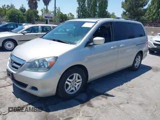 2005 Honda Odyssey EX-L with VIN 5FNRL38725B113815, listed as a IAAI auction lot 42754724 with 179,214 mi miles and . Bid and sale history available at DreamBid. Image 2.