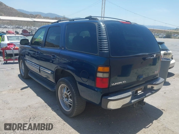 2005 GMC Yukon SLE z VIN 1GKEC13T85R150731, wystawiony jako IAAI lot #42385199 z przebiegiem 199 527 mil mil oraz . Historia ofert i sprzedaży dostępna na DreamBid. Obrazek 3.