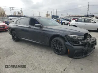 2022 BMW 7 Series 740i with VIN WBA7T2C04NCJ31237, listed as a Copart auction lot 76627214 with 44,630 mi miles and Salvage Title. Bid and sale history available at carsss.com. Image 4.