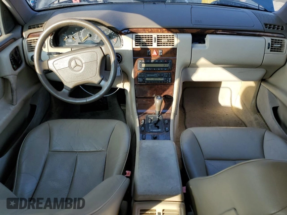 1997 Mercedes-Benz E 320 with VIN WDBJF55FXVA430115, listed as a Copart auction lot 43053715 with 158,057 mi miles and Clean Title. Bid and sale history available at DreamBid. Image 8.
