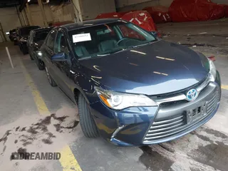 2015 Toyota Camry LE z VIN 4T1BD1FK2FU151947, wystawiony jako IAAI lot #42380693 z przebiegiem 83 201 mil mil oraz . Historia ofert i sprzedaży dostępna na DreamBid. Obrazek 1.