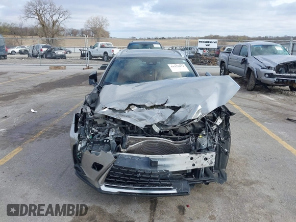 2019 Lexus UX 250h with VIN JTHU9JBH4K2005403, listed as a IAAI auction lot 41952074 with 73,883 mi miles and . Bid and sale history available at DreamBid. Image 13.
