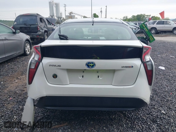 2016 Toyota Prius Two z VIN JTDKBRFUXG3519518, wystawiony jako IAAI lot #42209957 z przebiegiem 55 089 mil mil oraz . Historia ofert i sprzedaży dostępna na DreamBid. Obrazek 16.
