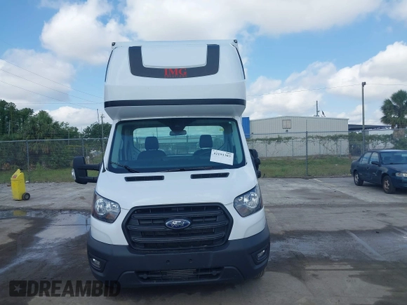 2023 Ford Transit z VIN 1FDBF6ZG0PKB35192, wystawiony jako IAAI lot #42191303 z przebiegiem 207 810 mil mil oraz . Historia ofert i sprzedaży dostępna na DreamBid. Obrazek 6.