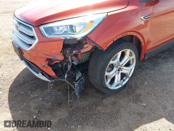2019 Ford Escape Titanium with VIN 1FMCU9J92KUB28895, listed as a IAAI auction lot 42065235 with 112,305 mi miles and . Bid and sale history available at DreamBid. Image 6.