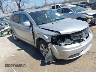 2009 Dodge Journey SXT with VIN 3D4GG57V19T138643, listed as a IAAI auction lot 41901454 with 150,576 mi miles. Bid and sale history available at carsss.com. Image 1.