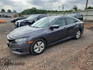 2017 Honda Civic LX with VIN 2HGFC2F55HH540145, listed as a Copart auction lot 64254015 with 235,657 mi miles and Salvage title. Bid and sale history available at DreamBid. Image 1.