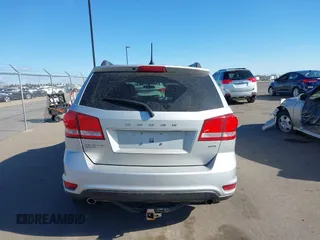 2013 Dodge Journey SXT with VIN 3C4PDDBG4DT506900, listed as a IAAI auction lot 42032379 with 130,911 mi miles and . Bid and sale history available at DreamBid. Image 16.