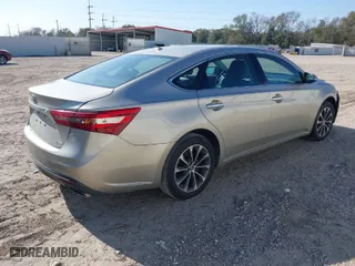 2016 Toyota Avalon Limited with VIN 4T1BK1EB7GU215795, listed as a IAAI auction lot 41244916 with 127,006 mi miles. Bid and sale history available at carsss.com. Image 4.
