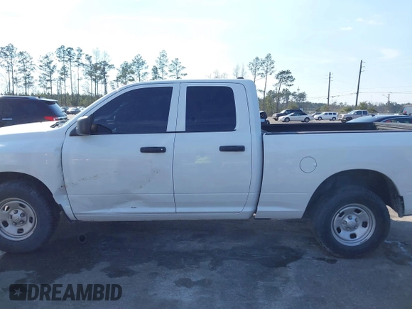 2018 Ram 1500 Tradesman with VIN 1C6RR6FG6JS347673, listed as a IAAI auction lot 41692169 with 121,631 mi miles and . Bid and sale history available at DreamBid. Image 14.